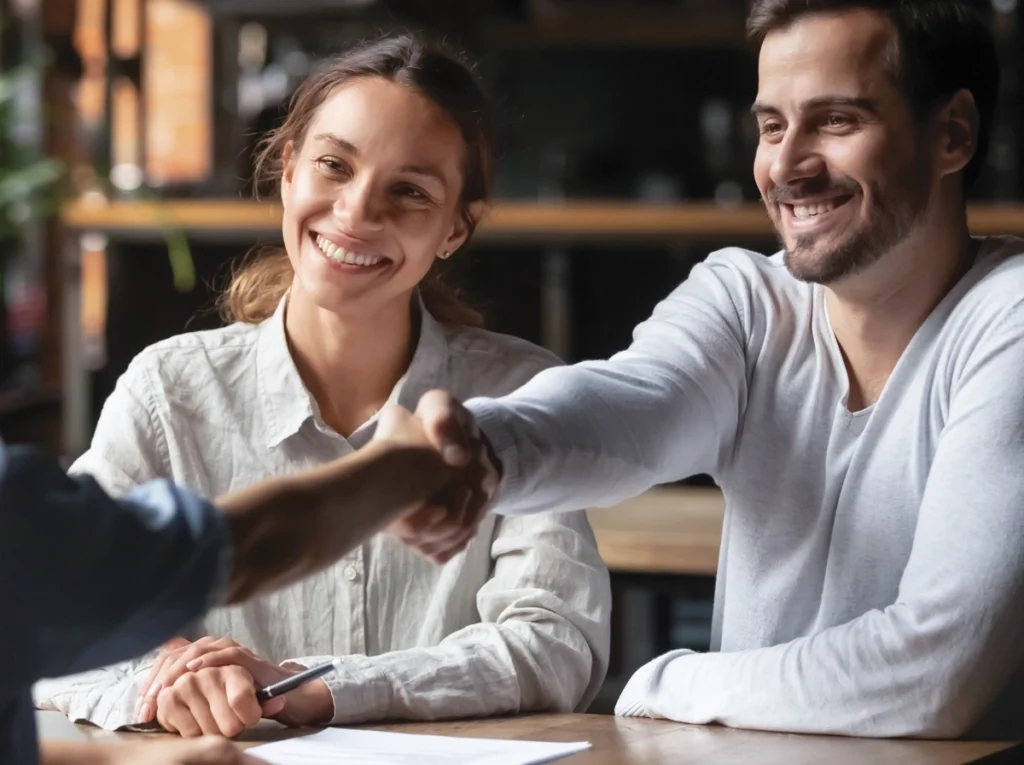 Équipe St-Pierre - Serrer main clients